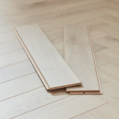 Berry Alloc Thirlmere Herringbone 8mm Laminate Flooring - Natural Sand
